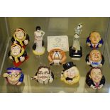 Collection of nine Kevin Francis Face Pots comprising: Split Decision (Gore and Bush), Churchill,