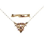 9ct gold pendant and chain set red stones, together with a similar brooch Condition: