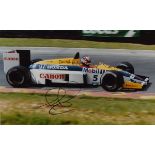 Motor Racing Interest - Nigel Mansell - Signed colour photograph of Mansell in his Formula 1 car,