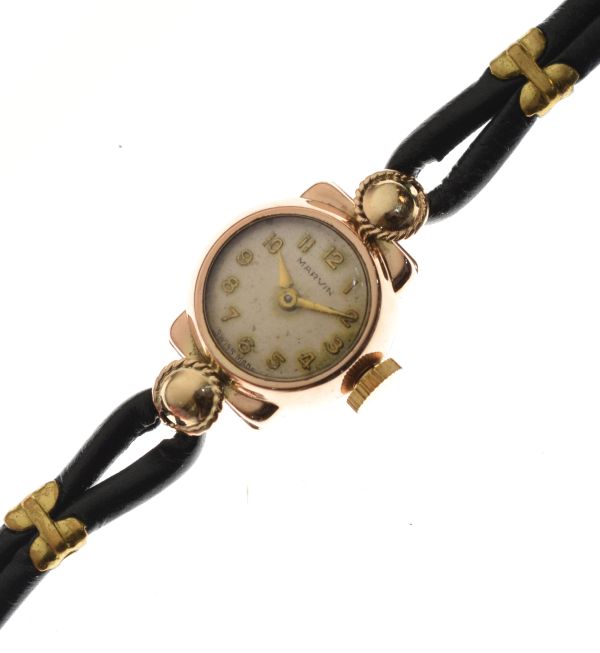 Lady's Marvin 9ct gold cased wristwatch on a leather strap Condition: