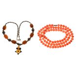 Modern amber and white metal necklace, together with another beaded necklace Condition: