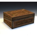 19th Century Indian carved writing box, the hinged cover opening to reveal a partially fitted