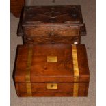 Early 20th Century oak smokers cabinet having moulded decoration together with a Victorian brass