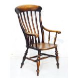 Victorian ash and elm lath back open arm Windsor elbow chair standing on turned supports united by