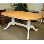 Oval pine dining table, the top stripped, the base painted white Condition: