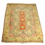 Modern Middle Eastern style wool carpet having allover geometric decoration within multi borders,