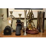 Brass skeleton clock, pair of chrome plated shell case vases, pair of binoculars etc Condition: