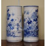 Pair of early 20th Century Japanese porcelain cylindrical vases, each having blue and white