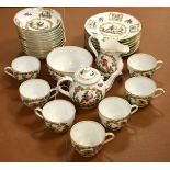 Early 20th Century tea service decorated with exotic birds, stamped 'Manufactured for Temple &