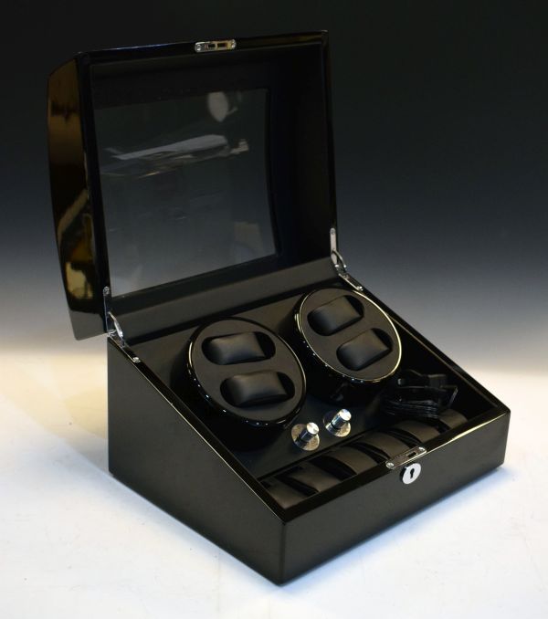 Battery or mains watch winder for watches having storage for six more watches Condition: