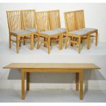 Modern light oak rectangular extending dining table and six matching lath back chairs Condition: