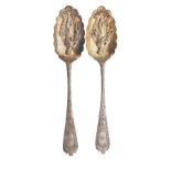 Pair of George III silver tablespoons, each having embossed decoration depicting a classical