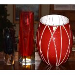 German red and white glass vase together with two cased glass vases Condition: