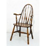 Early 20th Century elm and beech stick back Windsor elbow chair standing on splayed turned