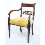 19th Century mahogany bar back open arm elbow chair having a stuffed seat and standing on tapered