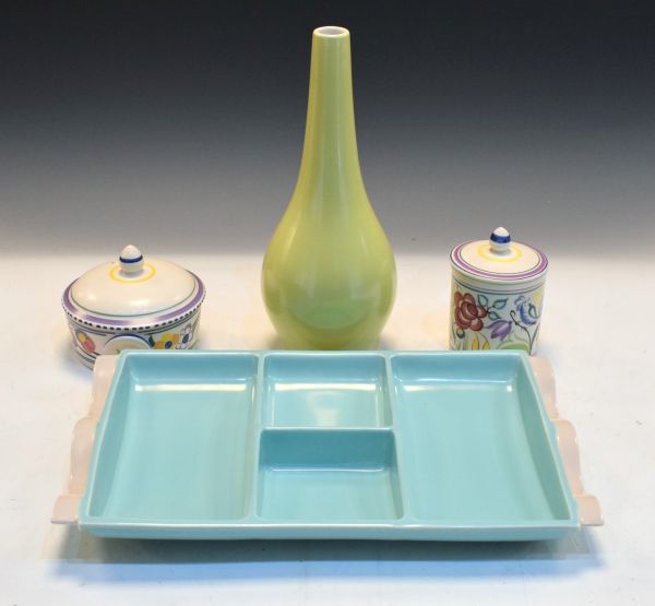 Five pieces of 1950's period Poole comprising: pale yellow glazed baluster vase, pale blue and