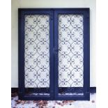 Pair of modern metal framed wrought iron gates/doors, dimensions of frame 148cm x 194cm Condition: