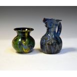 Elton Ware baluster shaped ewer having typical stylised foliate decoration on a blue/grey ground