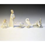 Lladro figure of a young girl in a nightgown, two Lladro figures of ducks and two Nao figures