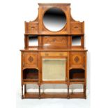 Late Victorian carved walnut chiffonier, the raised back fitted three bevelled mirrored panels, open