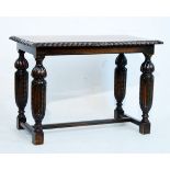1930's period Jacobean style rectangular topped occasional table having a gadrooned edge and