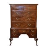 George III and later mahogany chest on stand, the upper section having a moulded dentil cornice,