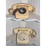 Two vintage cream plastic cased dial telephones Condition: