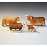 Four Beswick matt glazed cattle figures comprising: Highland Bull No.2008, Highland Cow No.17740,