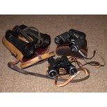 Pair of vintage Barr & Stroud binoculars and two other pairs Condition: