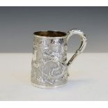 Small early 20th Century Chinese export silver mug typically decorated with dragons on a pitted
