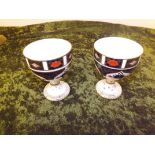 A pair of Royal Crown Derby Old Imari pattern pedestal goblets.