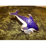 A Royal Crown Derby figurine number 1.1 depicting Leaping Dolphin.