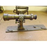 A most unusual mid 20th century brass surveyor's theodolite with levels and parallel rule, made by