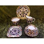 A 20th century Royal Crown Derby cigar pattern tea service comprising 2 bread and butter plates,