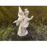 A Lladro figurine depicting Pierrot and ballet girl J-19E.