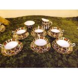 A Royal Crown Derby Old Imari pattern tea service comprising 6 cups, 6 saucers, milk jug and sugar