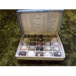 A 20th century box containing 25 gem stone eggs.