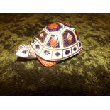 A Royal Crown Derby figurine depicting Tortoise LII.