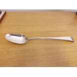 A large silver serving spoon hallmarked London 1790, maker's mark "GSWF", weighing approximately 3