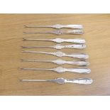 A set of 8 silver lobster picks by Walker & Hall, hallmarked Sheffield 1901, weighing