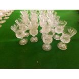 Eighteen cut pedestal Edinburgh Crystal Thistle wine glasses, 5" high, some A/F.