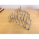 A 6-section silver toast rack made London 1803, weighing approximately 6 troy oz.