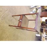 A small antique mahogany square section washstand with shaped frieze to the top and single drawer