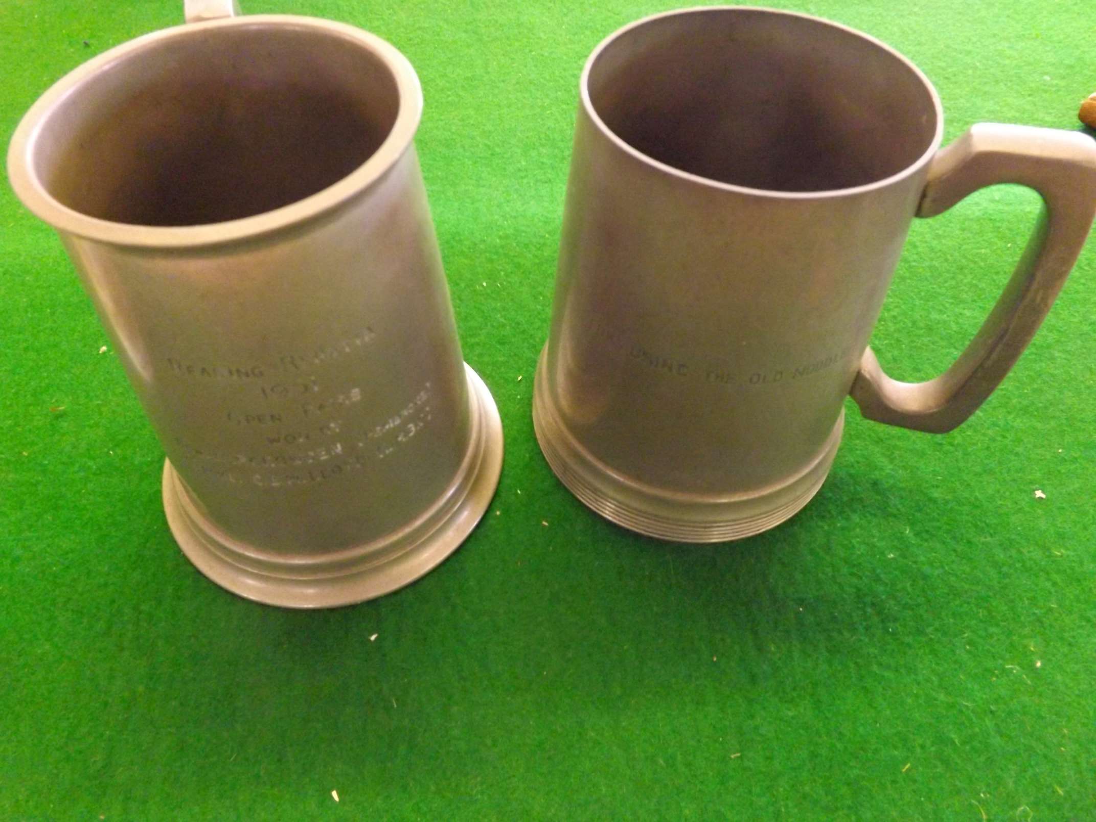 Two 20th century pewter tankards, one being Reading Regatta 1951 Open Pairs, won by JGP Crowden,