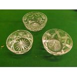 Three 20th century cut glass bowls.