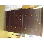 An antique tallboy chest on chest comprising 6 long drawers and 2 short drawers with turned knob