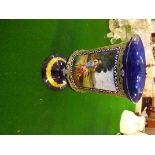 A 20th century blue Murano glass pedestal goblet with gilt and transfer decoration depicting