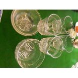 Two pairs of wine glass coolers and 3 small plain glass mixing bowls.