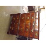 An 18th century walnut fronted chest on chest, the base having 2 long drawers on replacement bracket