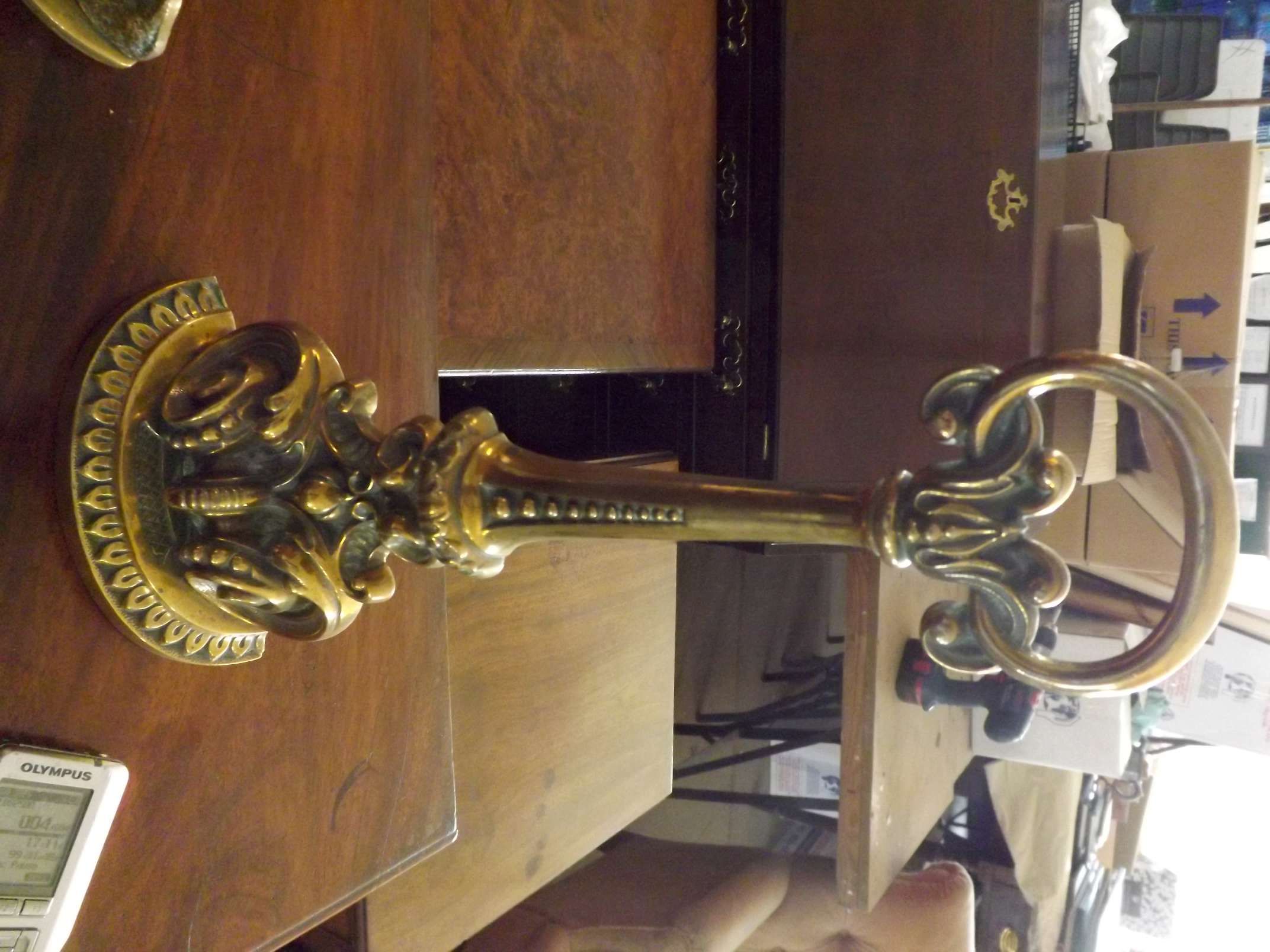 A Victorian cast brass stylised door stop.